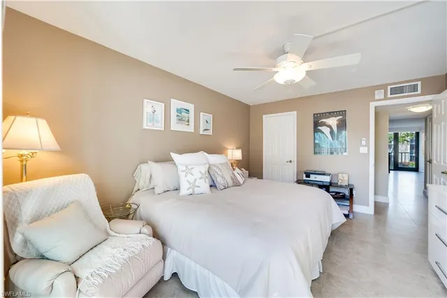 a front view of building with yard and green space