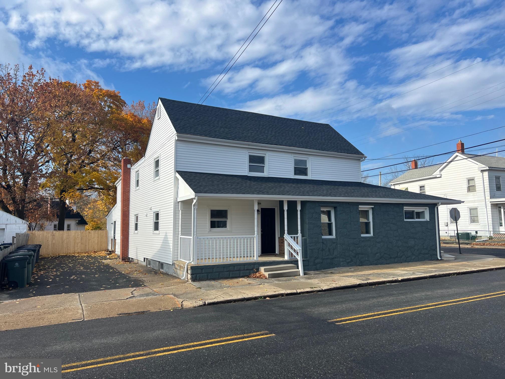 a view of a house with a street