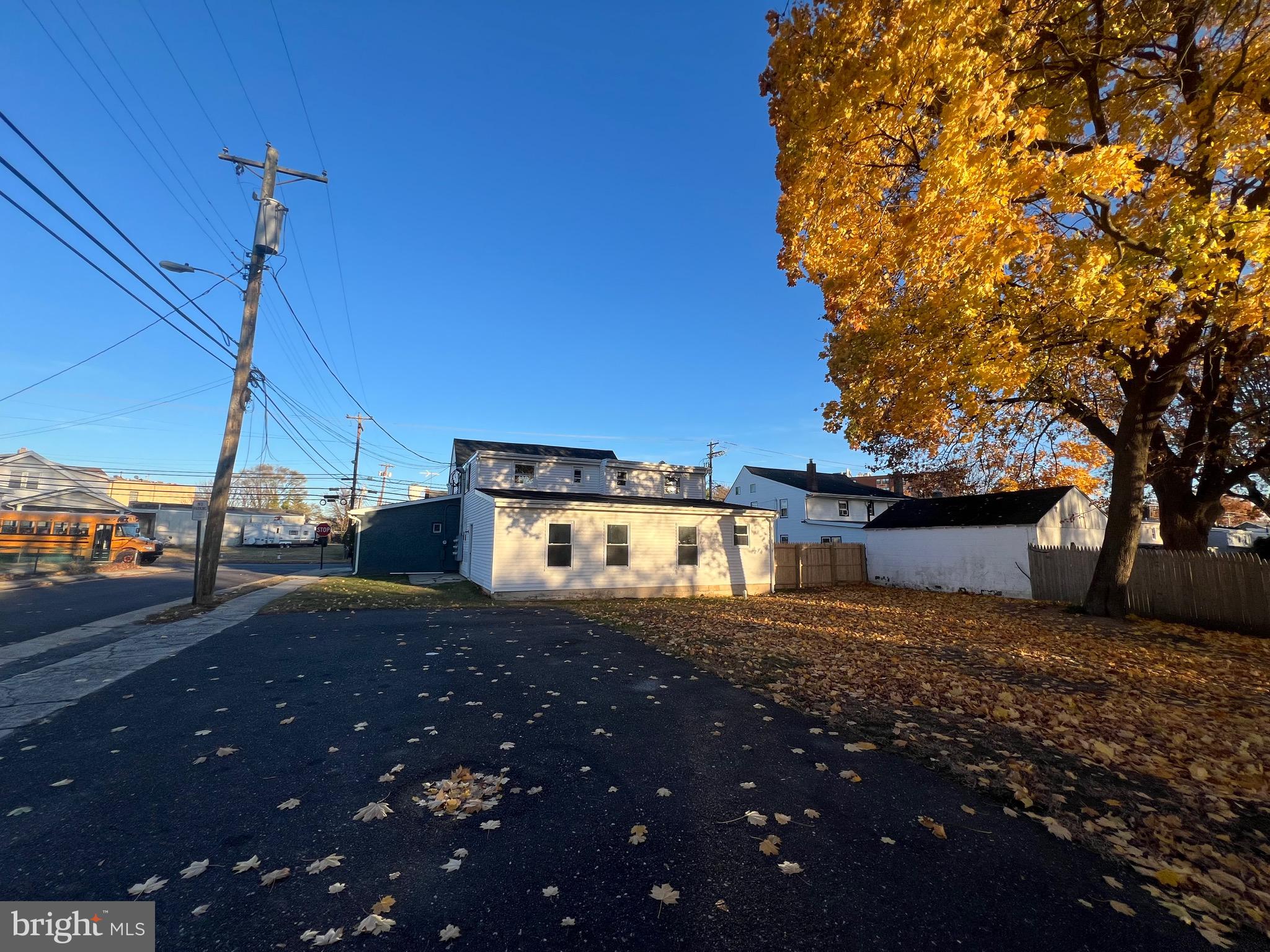 401 Blue Bell Road, Unit E Williamstown, NJ 08094 - Photo 11 of 11 a view of a house with a yard