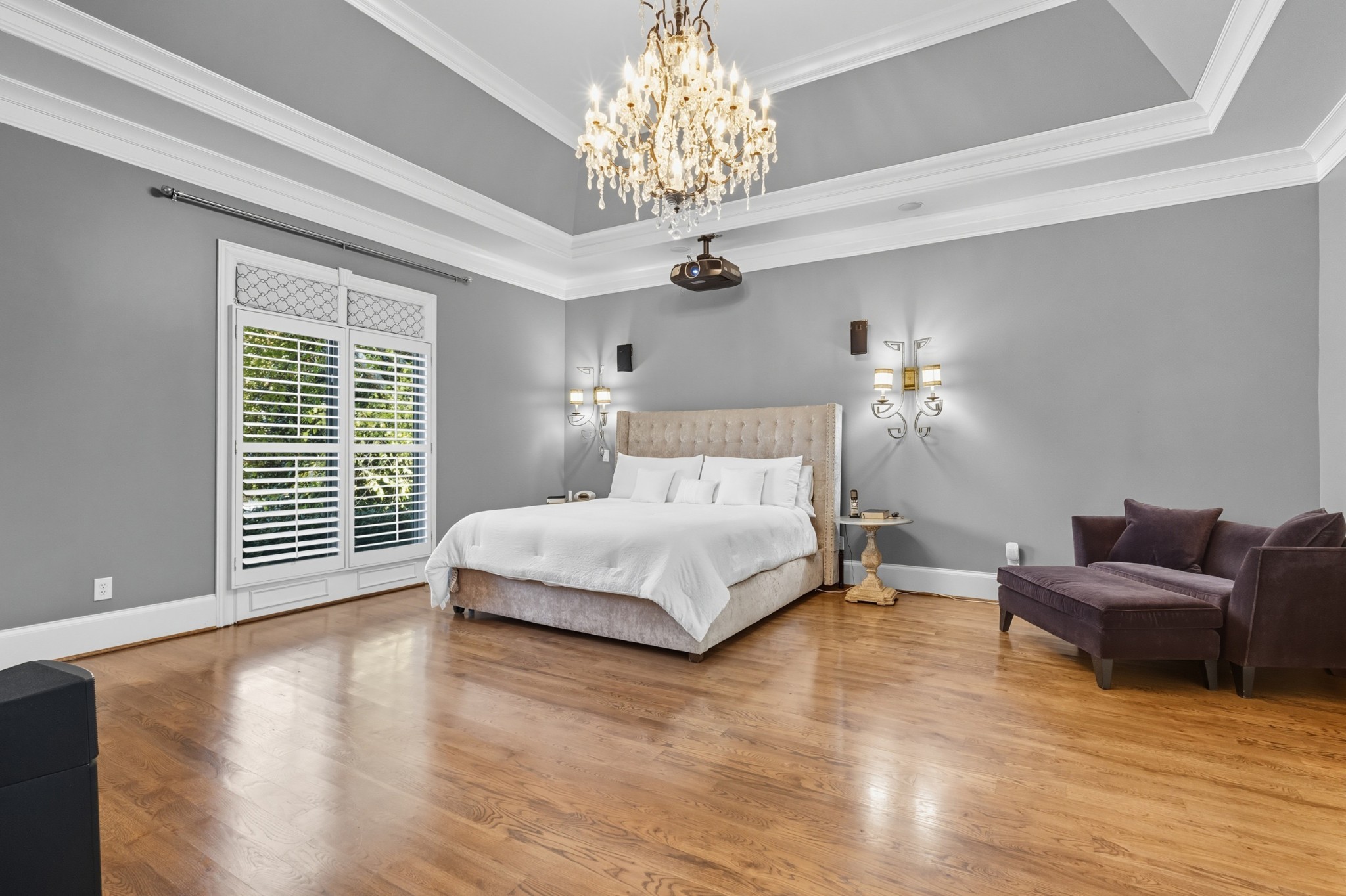 700 Princeton Hills Drive Brentwood, TN 37027 - Photo 15 of 42 a spacious bedroom with a bed and a chandelier