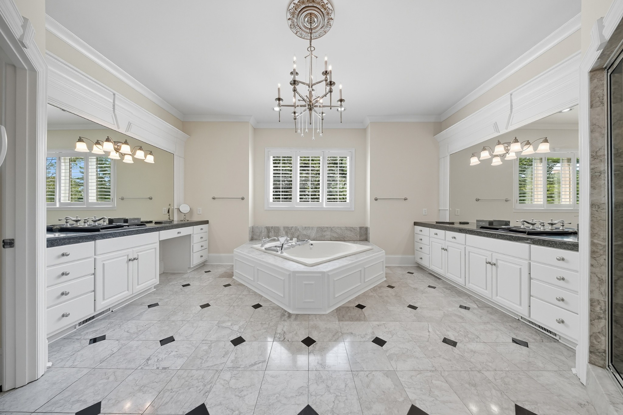 700 Princeton Hills Drive Brentwood, TN 37027 - Photo 16 of 42 a bathroom with a sink mirror and a bathtub