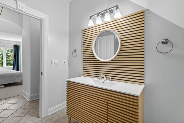 a view of a livingroom with furniture and kitchen view