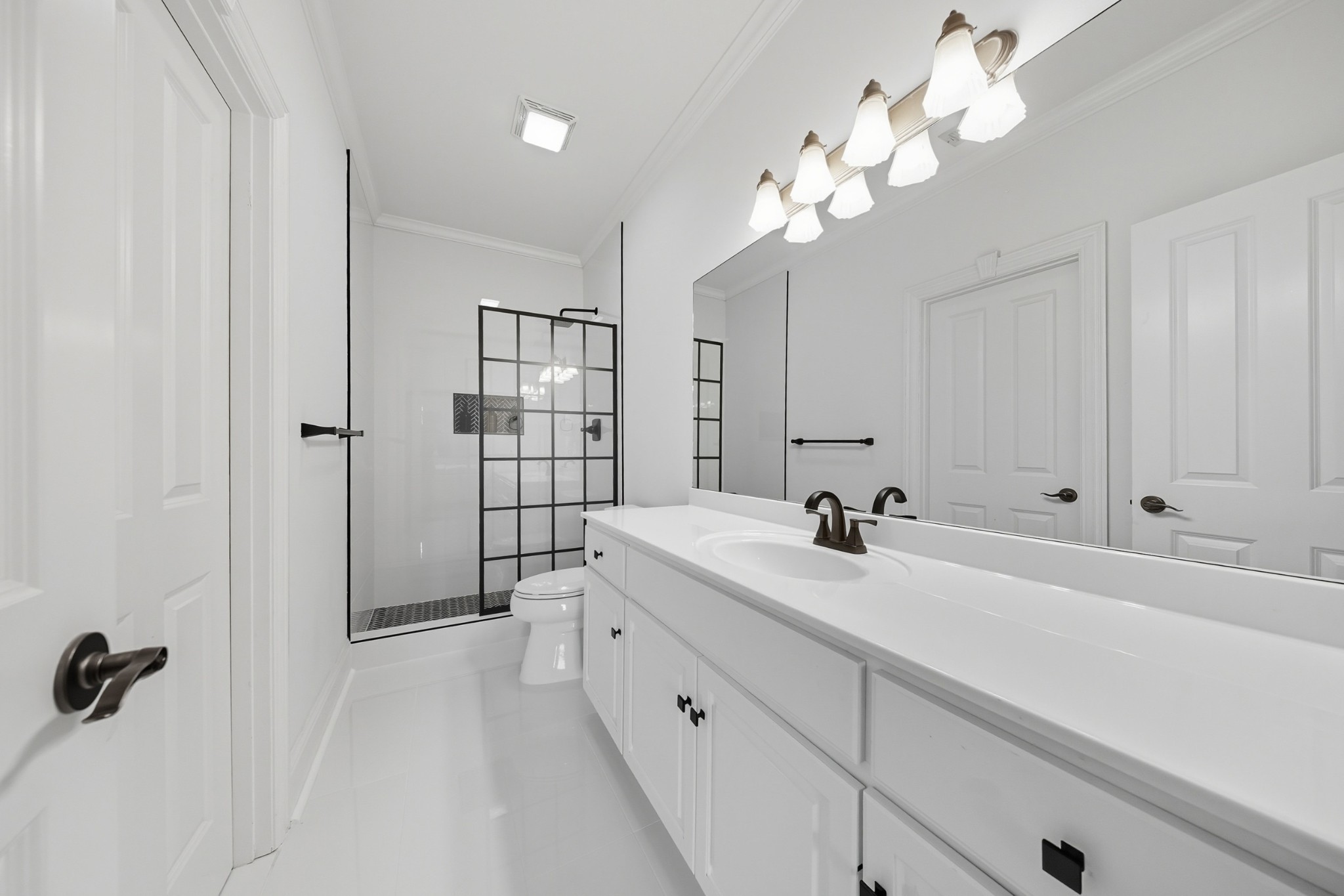 700 Princeton Hills Drive Brentwood, TN 37027 - Photo 22 of 42 a bathroom with a sink a large mirror and shower