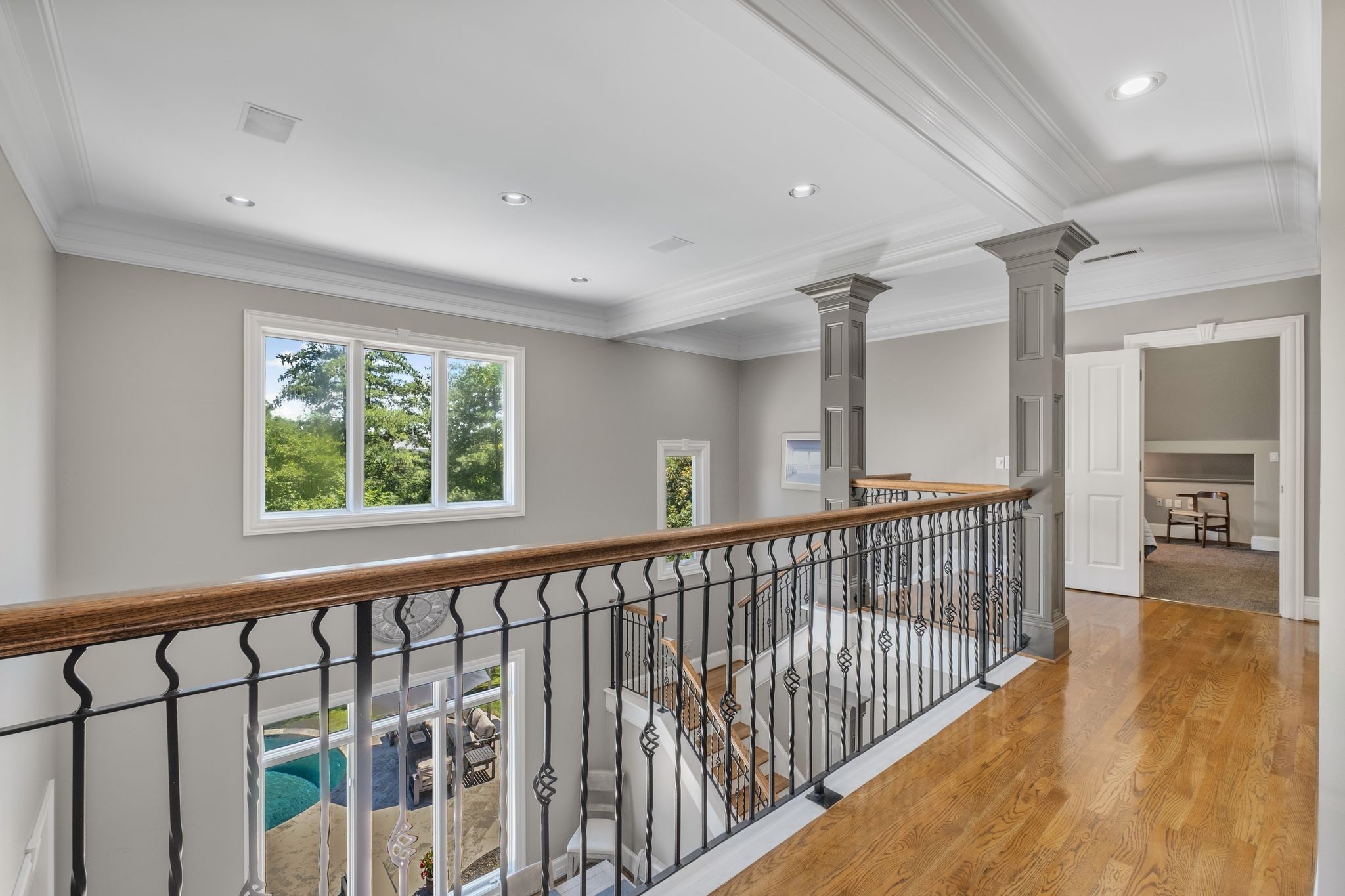 700 Princeton Hills Drive Brentwood, TN 37027 - Photo 23 of 42 a view of a hallway with wooden floor and stairs