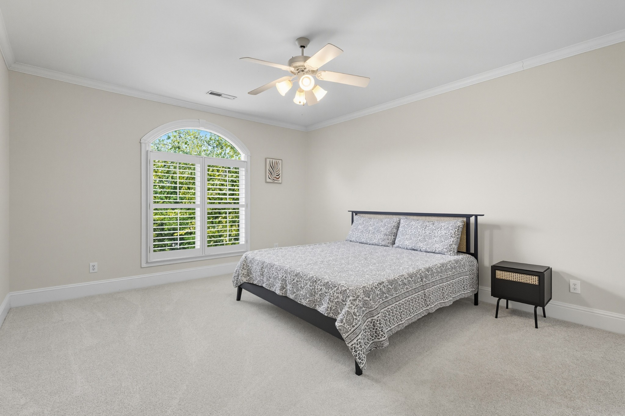 700 Princeton Hills Drive Brentwood, TN 37027 - Photo 24 of 42 a spacious bedroom with a bed and a chandelier