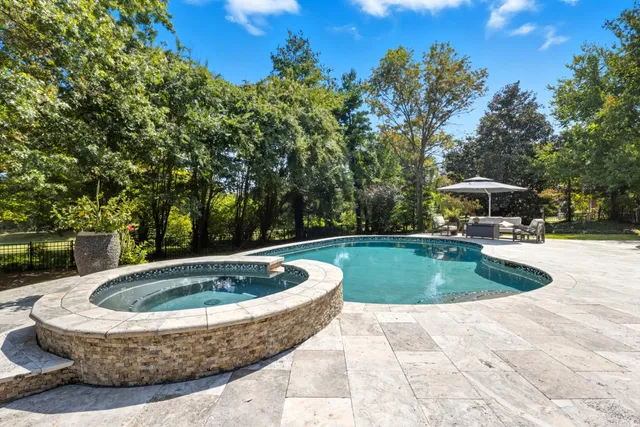 a view of outdoor space yard swimming pool and patio