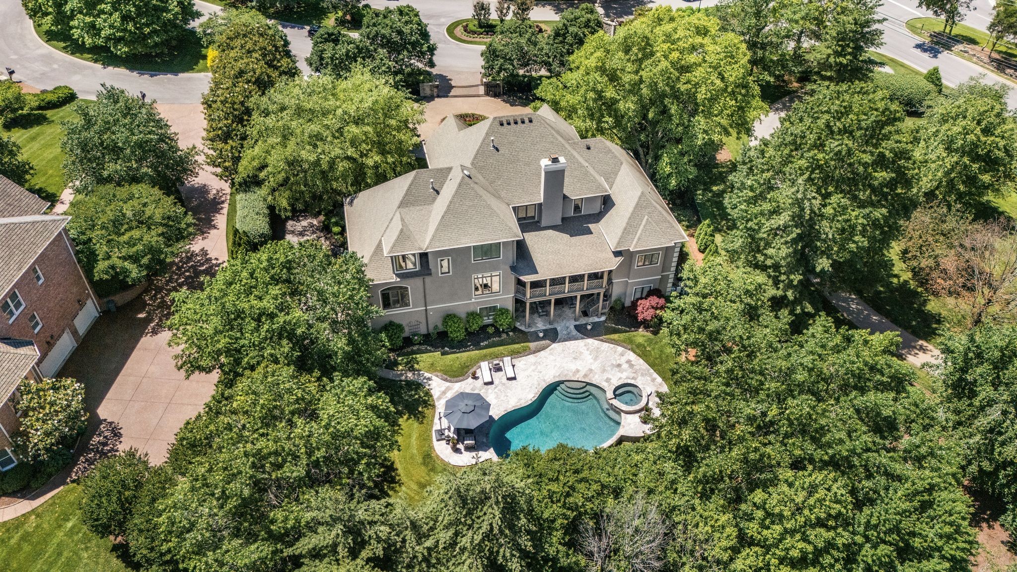 700 Princeton Hills Drive Brentwood, TN 37027 - Photo 40 of 42 an aerial view of a house with swimming pool and garden
