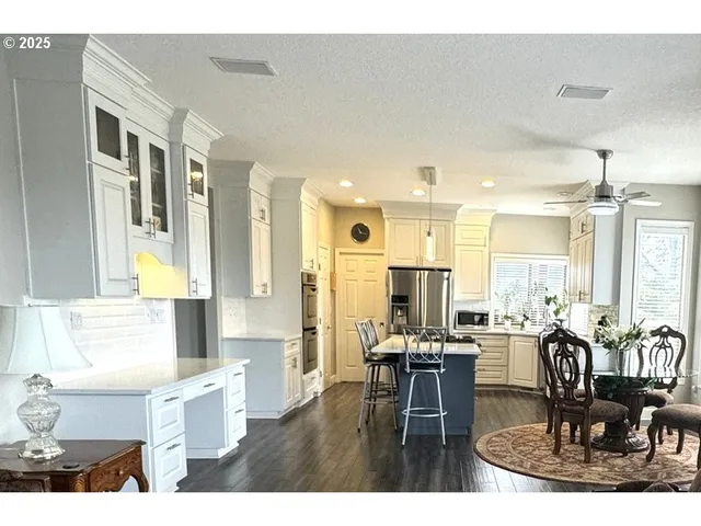 a view of a dining room with furniture
