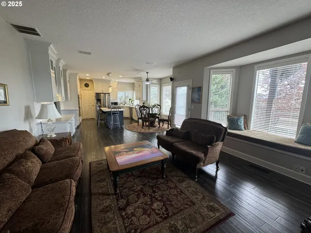 a bathroom with a shower and a sink