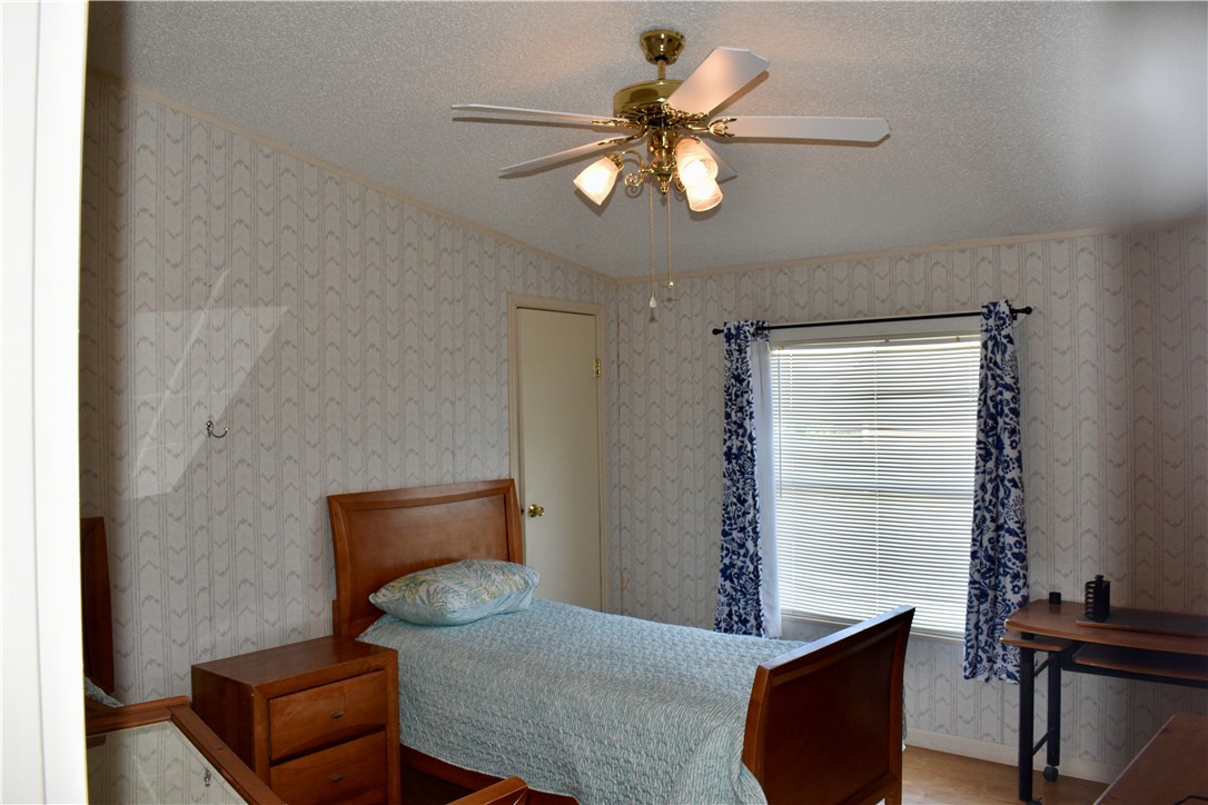 25051 Lake Shore Drive Mathis, TX 78368 - Photo 27 of 40 a living room with furniture and a window