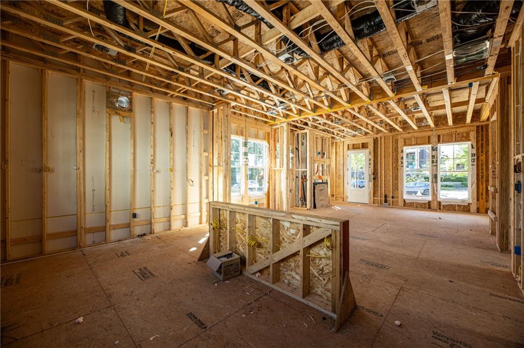 135 Alcovy Terrace Alpharetta, GA 30009 - Photo 19 of 56 a view of an empty room with windows