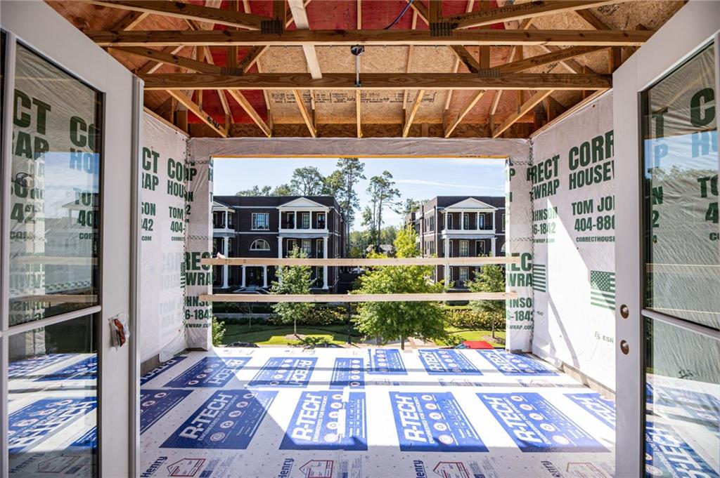 135 Alcovy Terrace Alpharetta, GA 30009 - Photo 31 of 56 a view of a porch with a rug