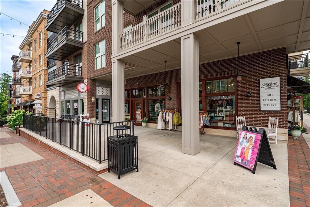 135 Alcovy Terrace Alpharetta, GA 30009 - Photo 42 of 56 a view of a building with sitting area