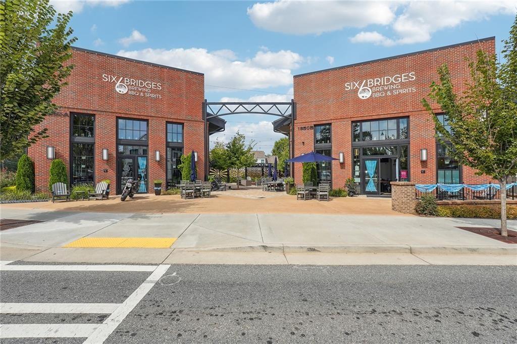 135 Alcovy Terrace Alpharetta, GA 30009 - Photo 45 of 56 a view of a building with a street