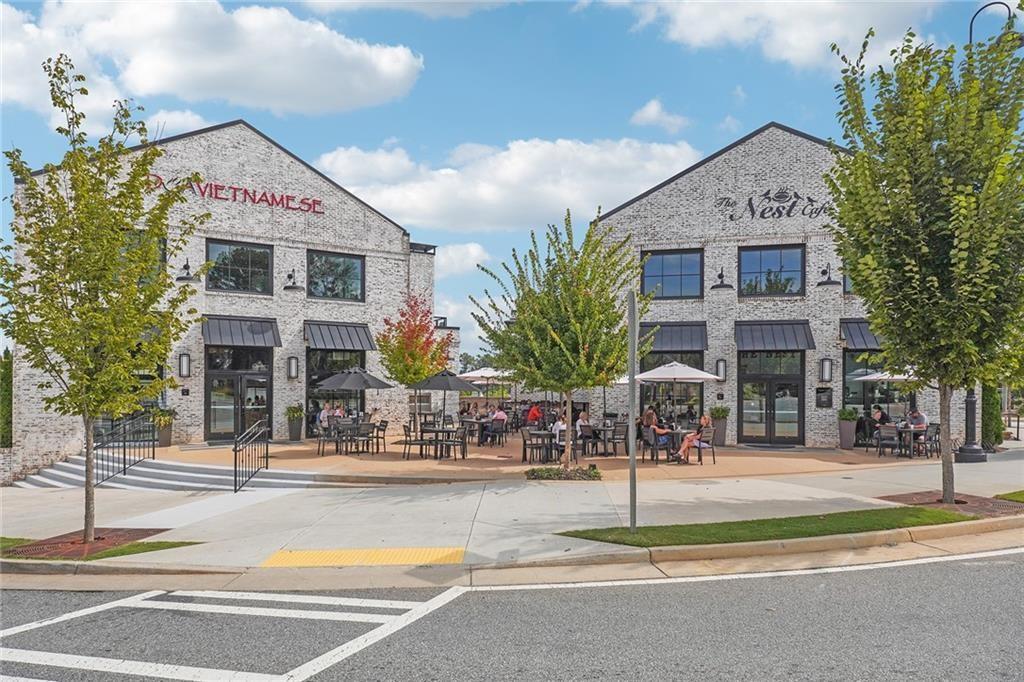 135 Alcovy Terrace Alpharetta, GA 30009 - Photo 46 of 56 a view of a building with a street
