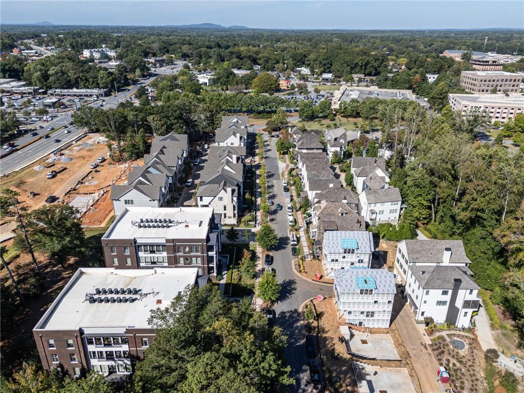 135 Alcovy Terrace Alpharetta, GA 30009 - Photo 5 of 56 an aerial view of a city with lots of residential buildings