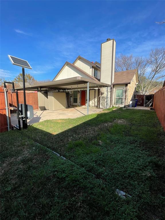 2917 Roxboro Road Euless, TX 76039 - Photo 19 of 20 a front view of a house with a garden