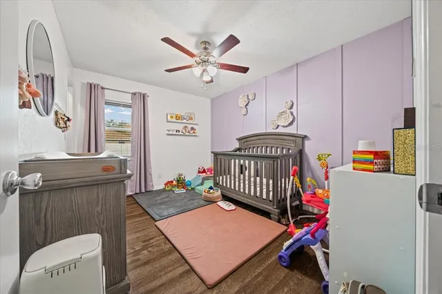 a bedroom with furniture and a bed