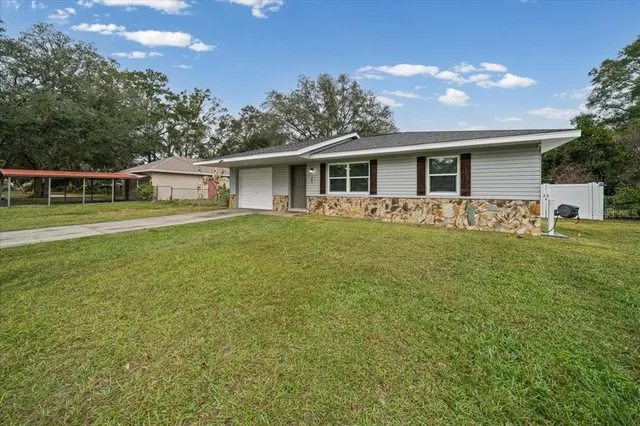 a house view with a garden space