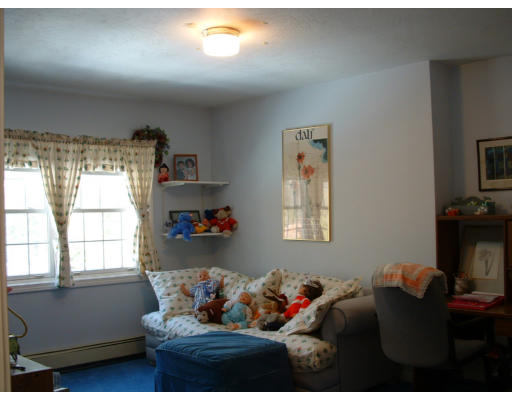 72 Hutchinson Road Sutton, MA 01590 - Photo 14 of 20 a living room with furniture and a window
