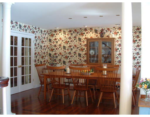 72 Hutchinson Road Sutton, MA 01590 - Photo 4 of 20 a view of a dining room with furniture and chandelier