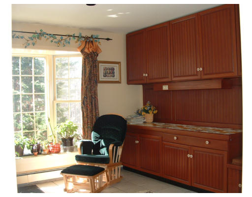 72 Hutchinson Road Sutton, MA 01590 - Photo 7 of 20 a living room with furniture and a window