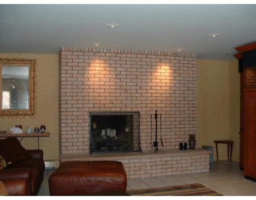 72 Hutchinson Road Sutton, MA 01590 - Photo 8 of 20 a living room with furniture and a fireplace