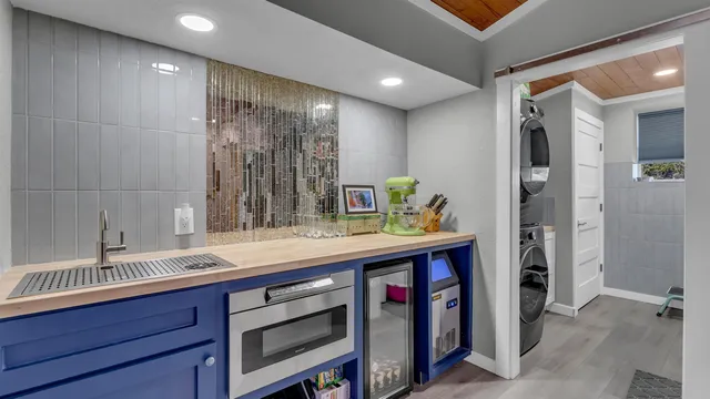 a bathroom with a double vanity sink and a mirror