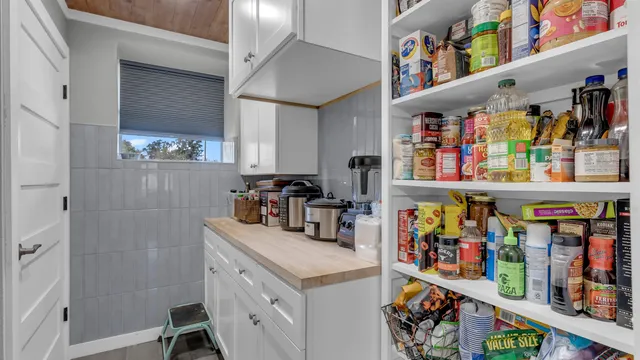 a storage room with washer and dryer