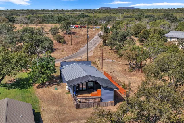a view of a house with a mountain