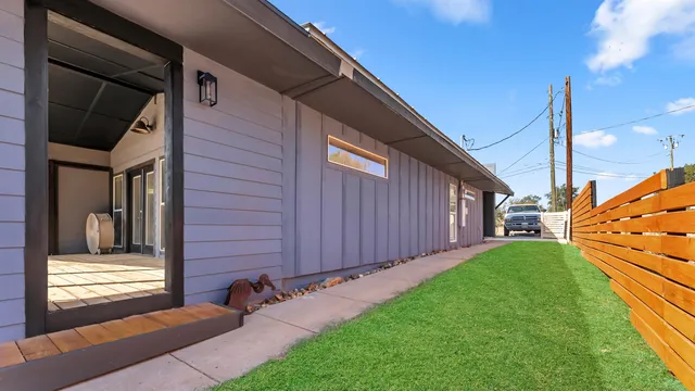 a view of a back yard of the house