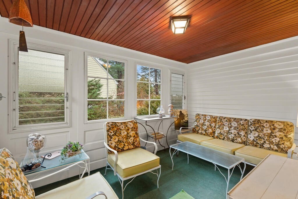 9 Preston Road Lexington, MA 02420 - Photo 21 of 25 a living room with furniture and a large window