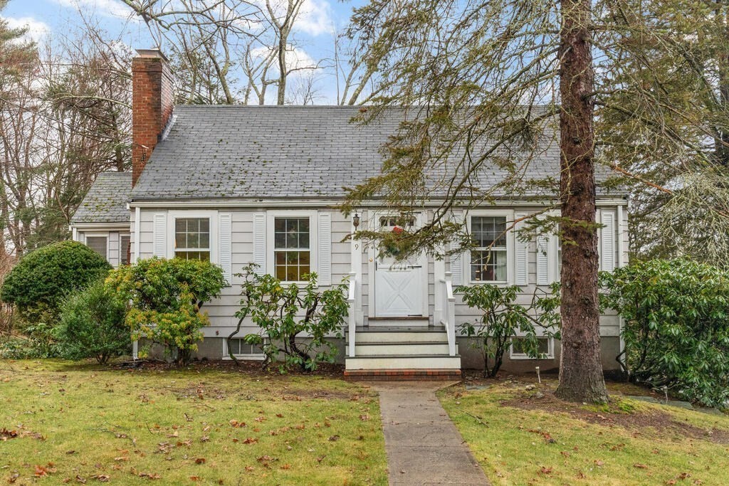 9 Preston Road Lexington, MA 02420 - Photo 25 of 25 a view of a house with a small yard and potted plants