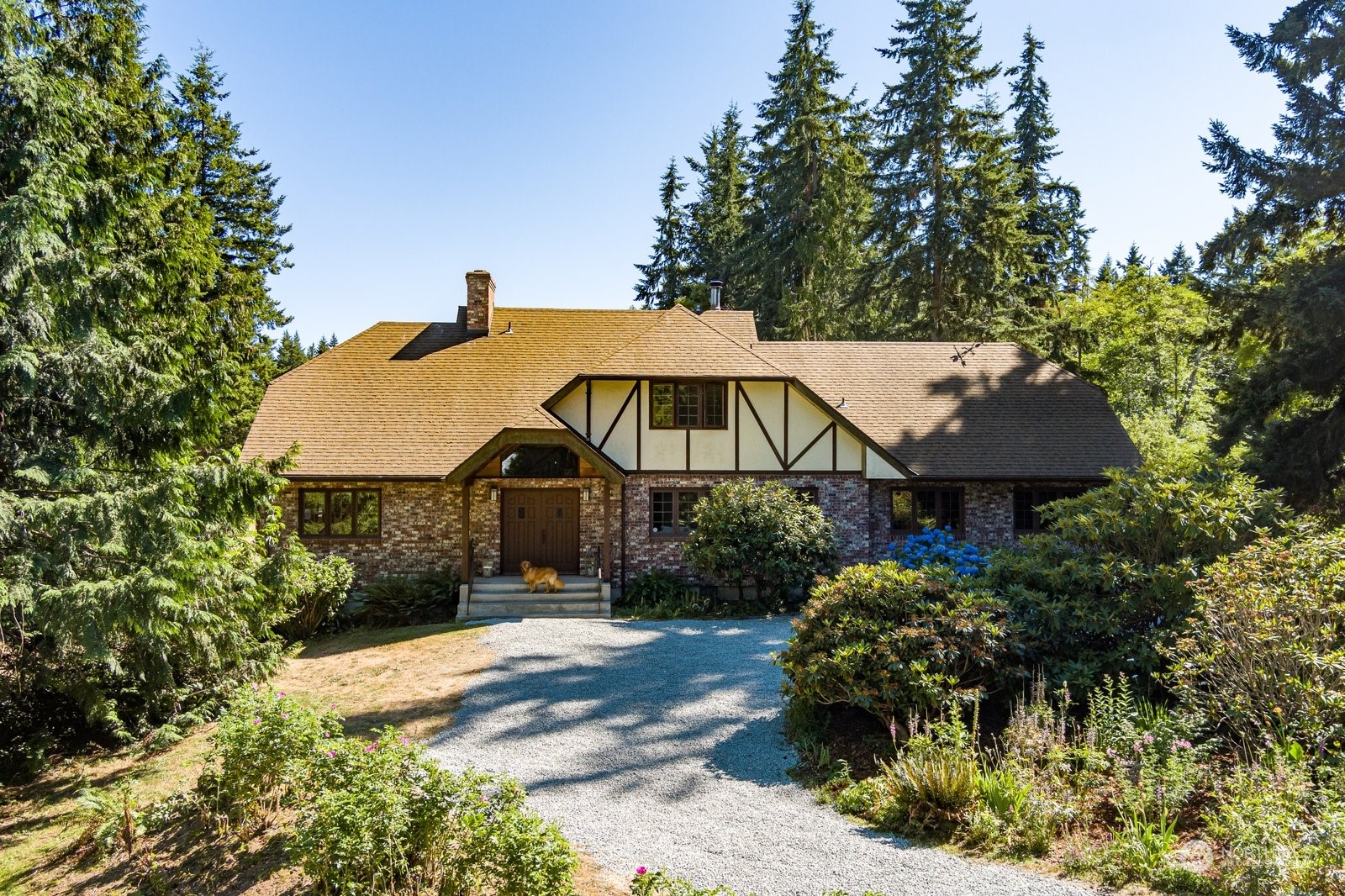 3550 Swede Hill Road Clinton, WA 98236 - Photo 1 of 40 a house view with a garden space