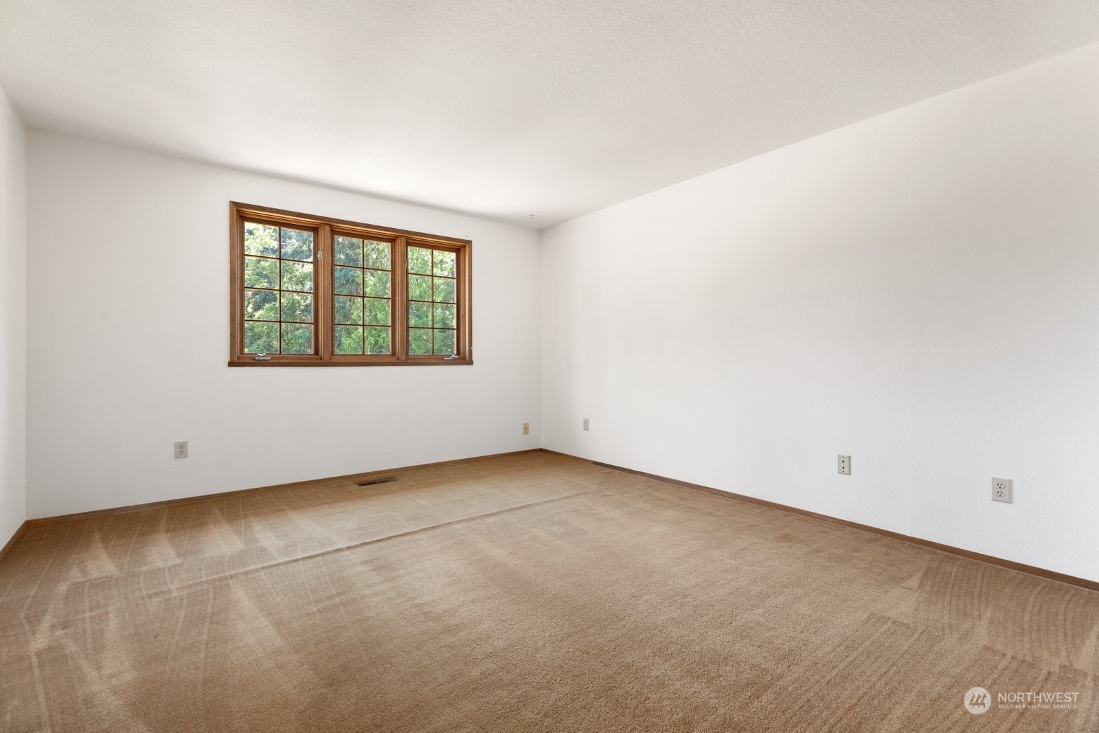 3550 Swede Hill Road Clinton, WA 98236 - Photo 25 of 40 an empty room with a window
