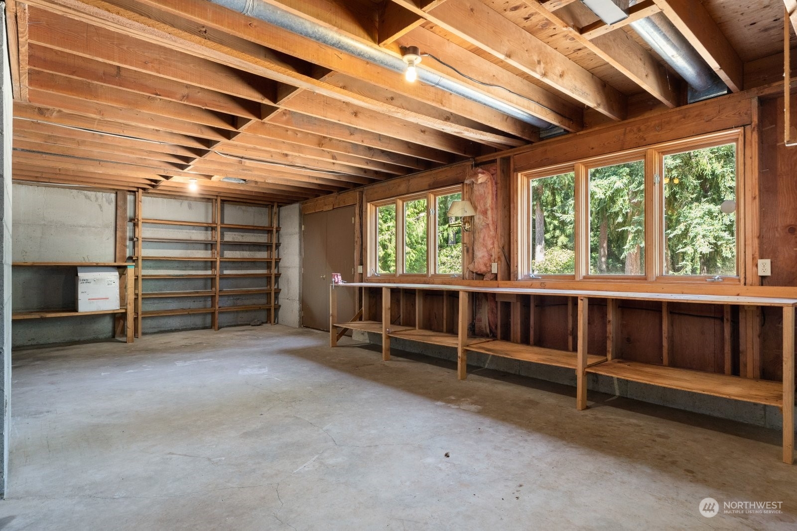 3550 Swede Hill Road Clinton, WA 98236 - Photo 27 of 40 a view of an empty room with a balcony