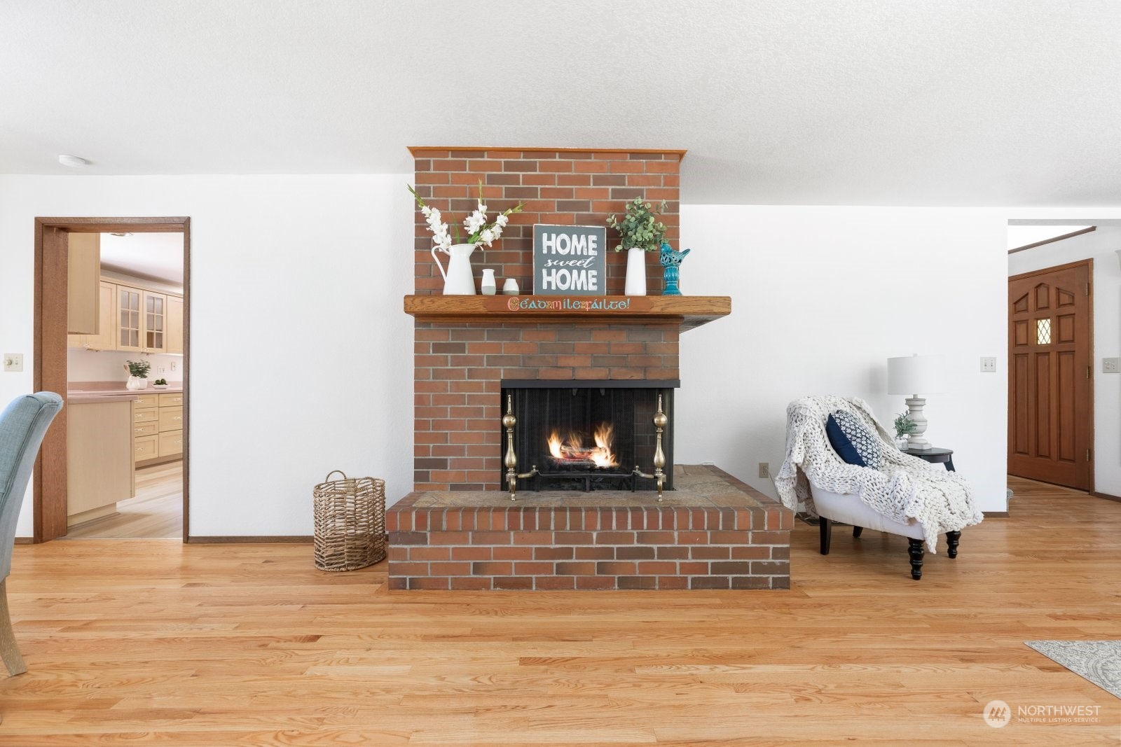 3550 Swede Hill Road Clinton, WA 98236 - Photo 6 of 40 a living room with furniture and a fireplace
