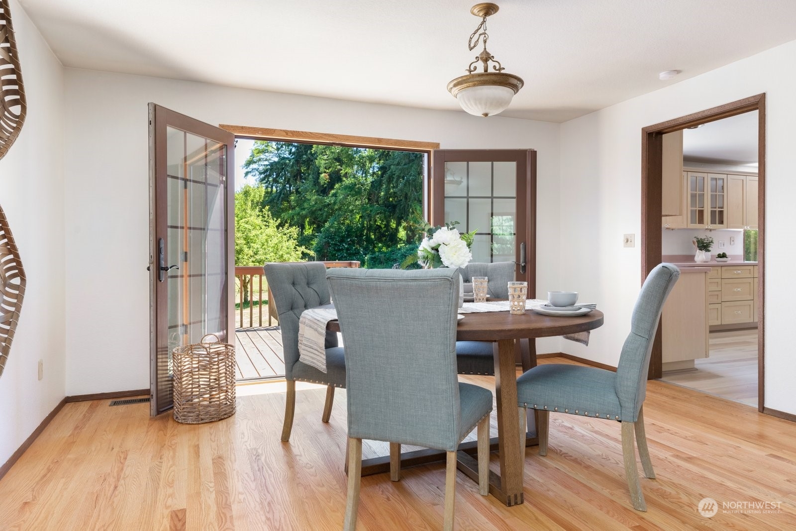 3550 Swede Hill Road Clinton, WA 98236 - Photo 7 of 40 a view of a dining room with furniture window and wooden floor