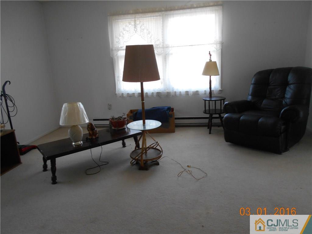 271 B Old Nassau Road Monroe Township, NJ 08831 - Photo 7 of 8 a living room with furniture and a window