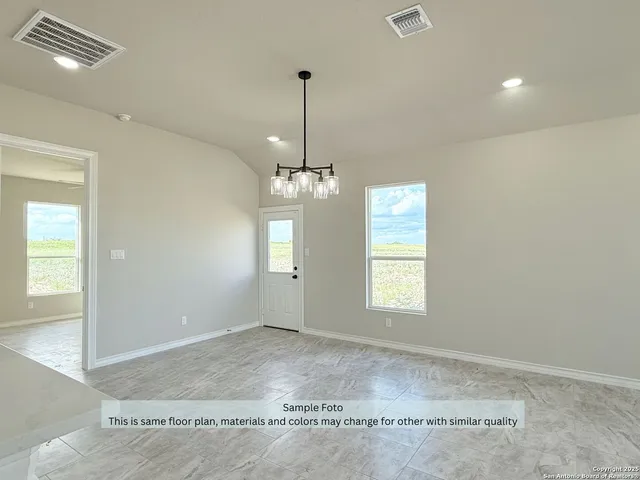 a view of an empty room with window