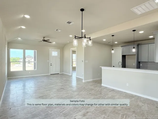 a view of a kitchen and a window