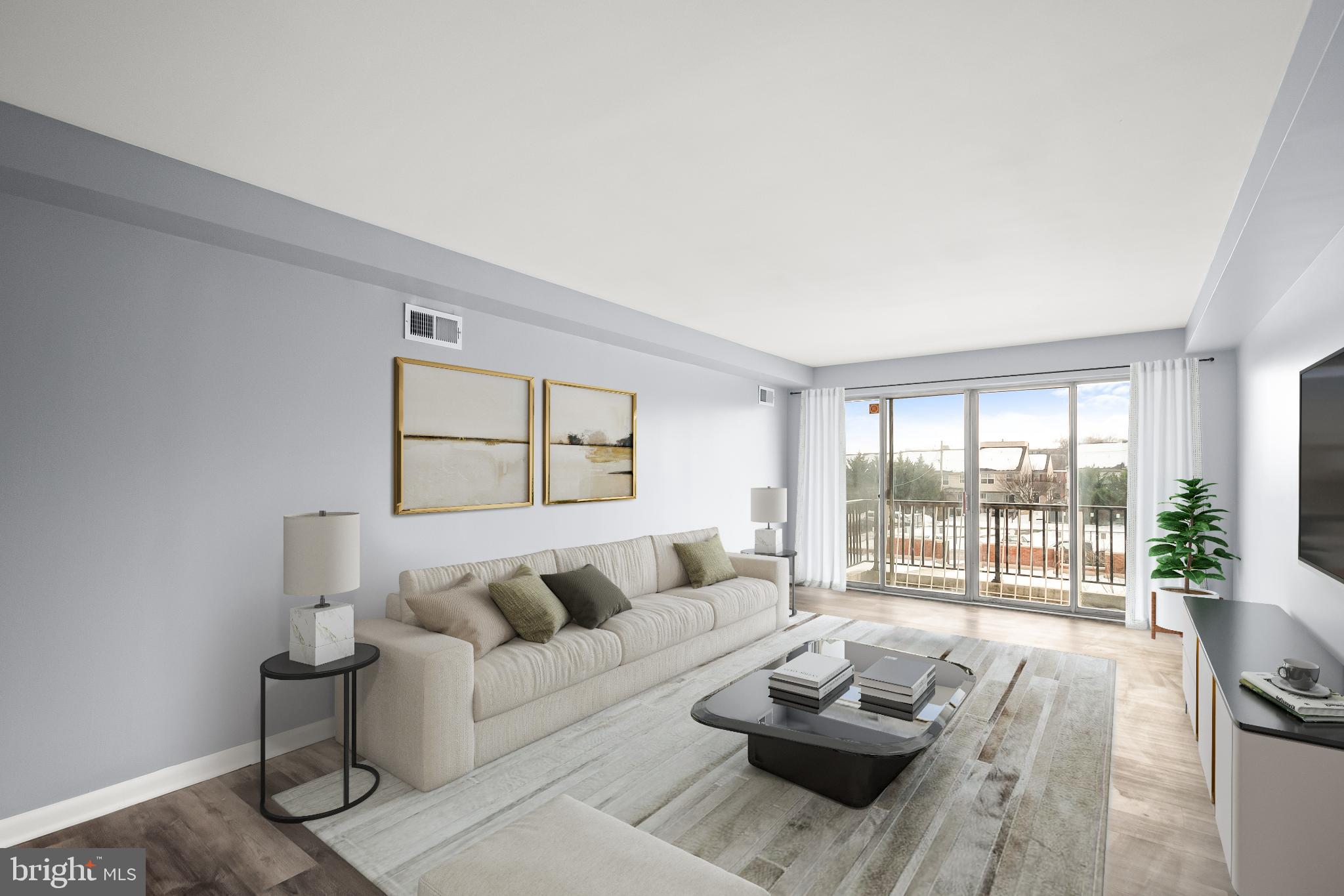 3601 Clarks Lane, Unit 322 Baltimore, MD 21215 - Photo 16 of 38 Virtually staged living room and balcony.