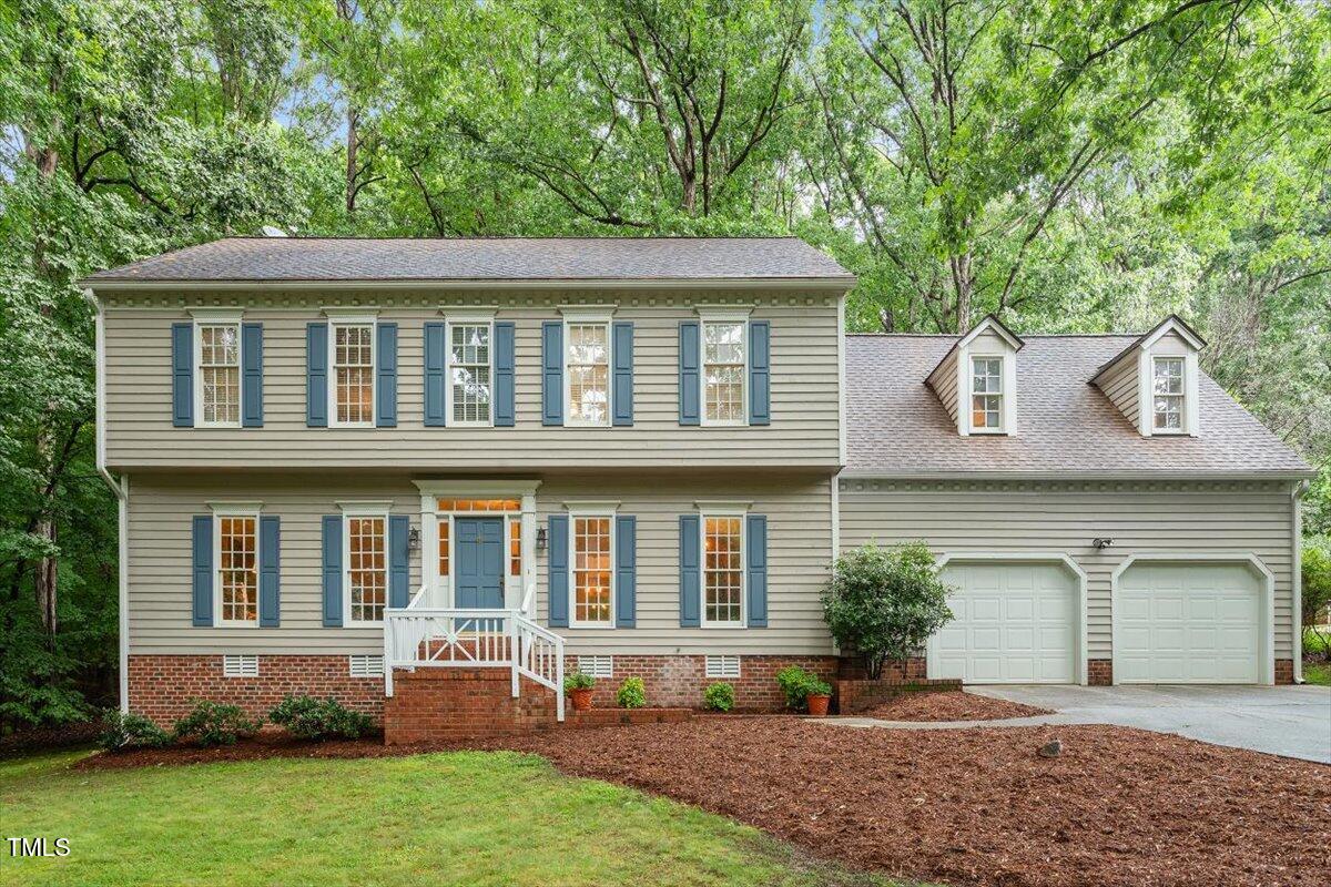 12329 Whartons Way Raleigh, NC 27613 - Photo 1 of 51 front view of a house with a yard