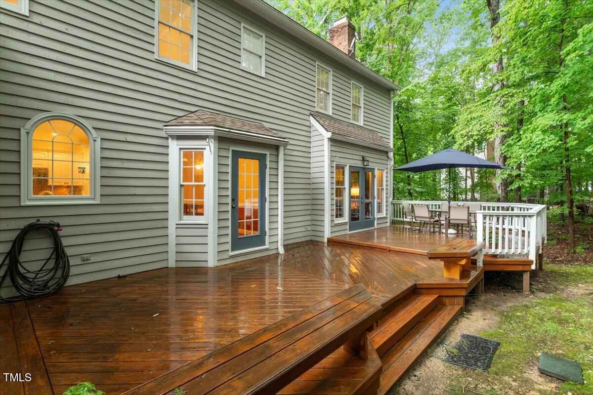 12329 Whartons Way Raleigh, NC 27613 - Photo 20 of 51 a view of a house with a yard