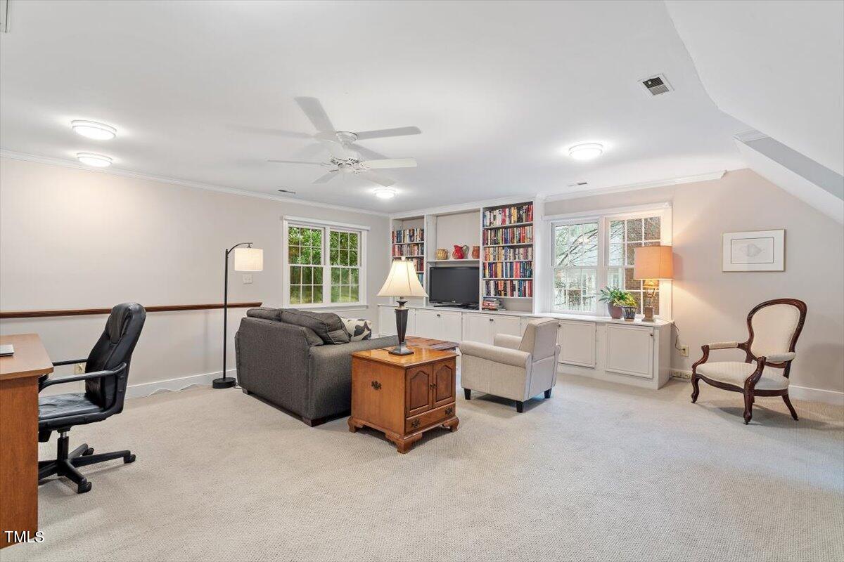 12329 Whartons Way Raleigh, NC 27613 - Photo 34 of 51 a living room with furniture and a window