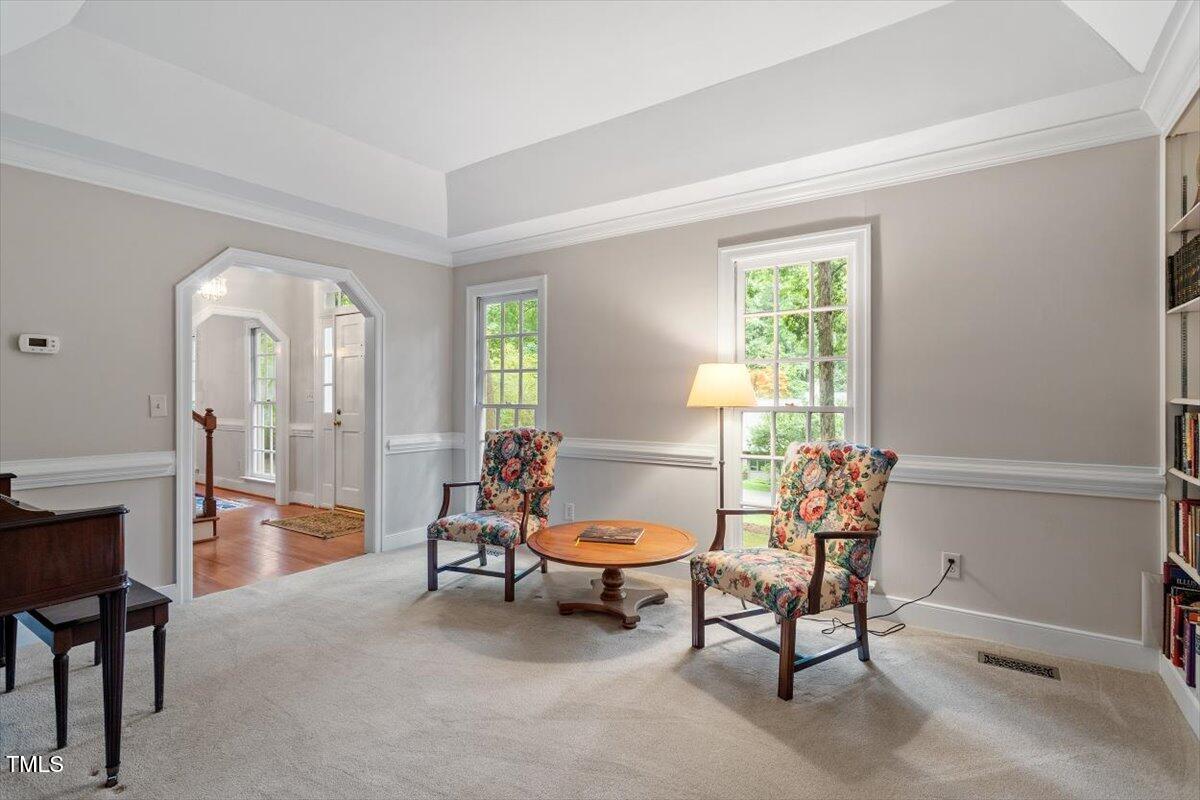 12329 Whartons Way Raleigh, NC 27613 - Photo 35 of 51 a living room with furniture and a window