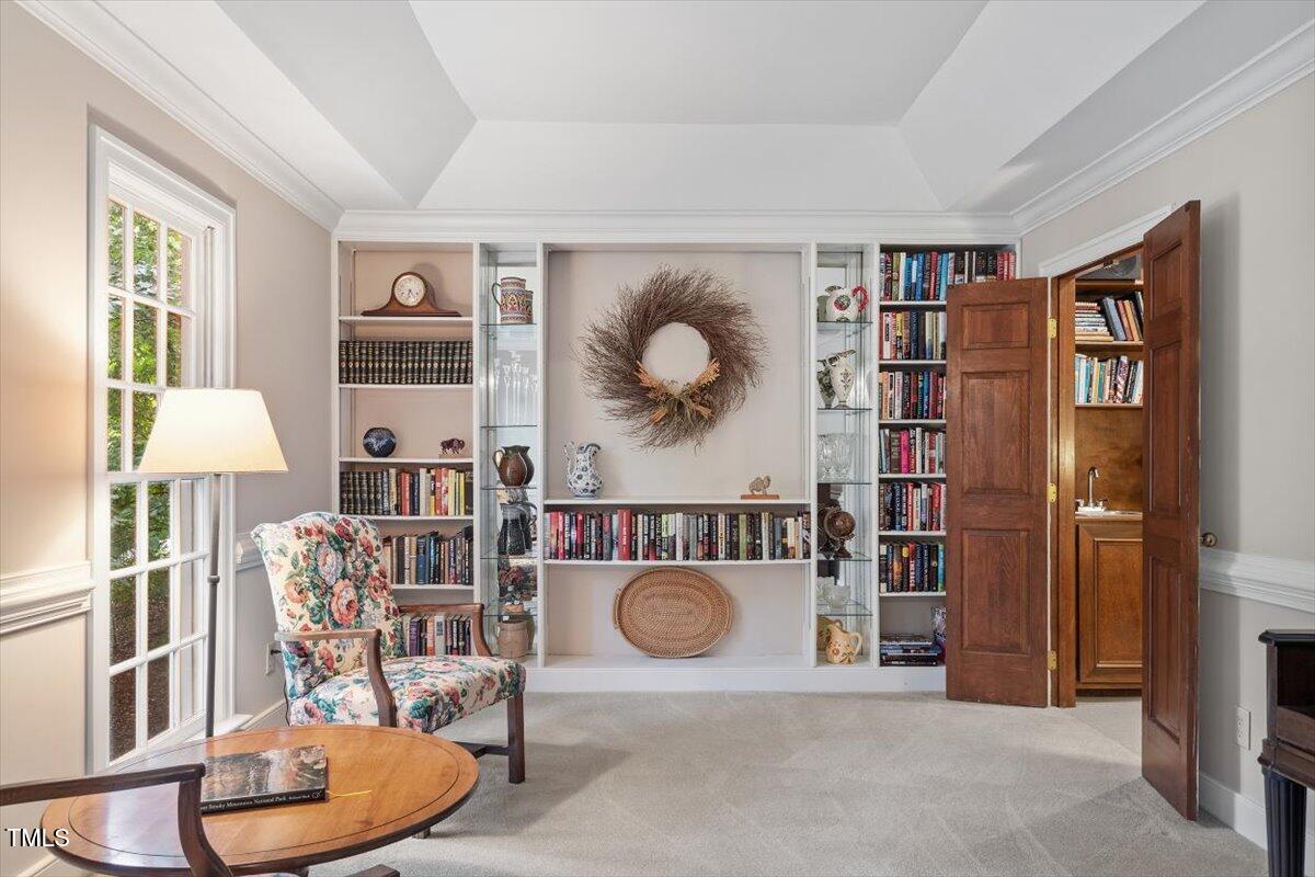 12329 Whartons Way Raleigh, NC 27613 - Photo 6 of 51 a workspace with furniture and a book shelf