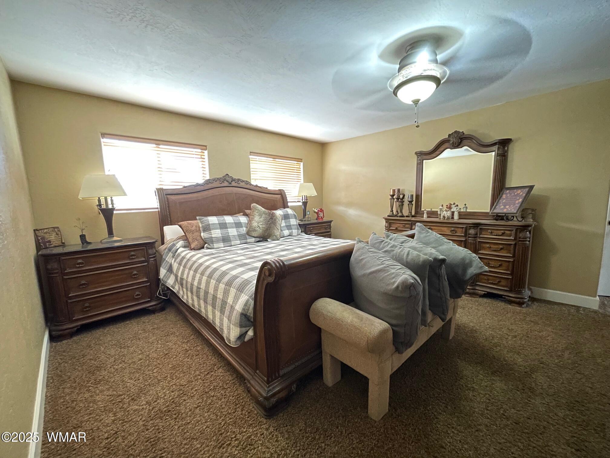 183 North Becker Lake Road Springerville, AZ 85938 - Photo 26 of 41 a bedroom with bed and window