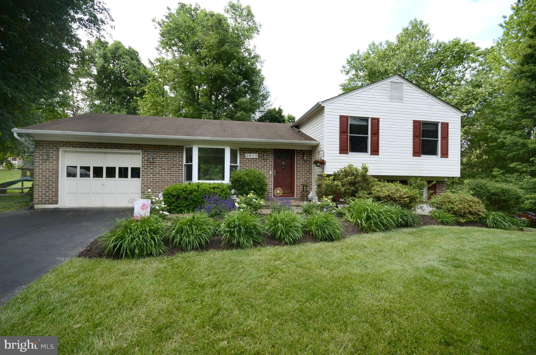 3612 Briars Road Brookeville, MD 20833 - Photo 1 of 21 a view of a house with yard and plants