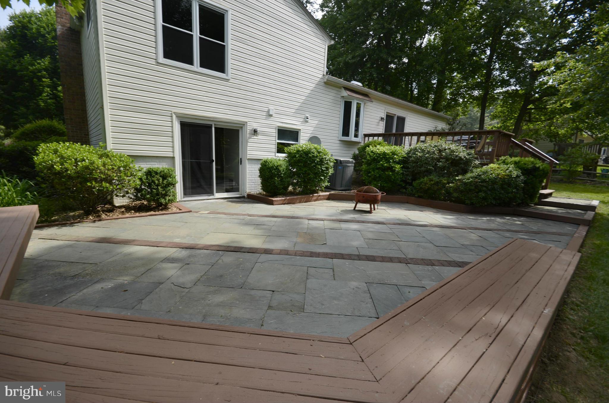3612 Briars Road Brookeville, MD 20833 - Photo 16 of 21 a view of a house with backyard and plants